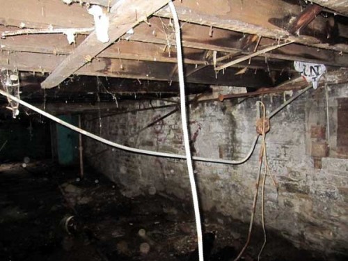 Run down cellar in a townhouse shell Run down cellar in a townhouse shell