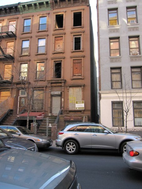 Front of 168 West 123rd Street - A Harlem brownstone shell Front of 168 West 123rd Street - A Harlem brownstone shell