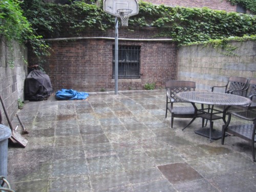 Back yard - 413 West 154th Street Back yard with basketball hoop