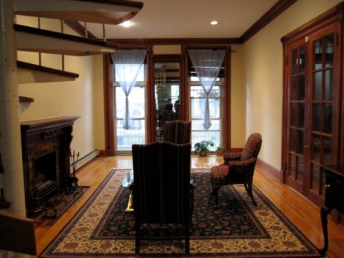 Living room with spiral staircase up to master bedroom Living room with spiral staircase up to master bedroom