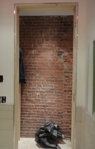 nicely lit brick wall