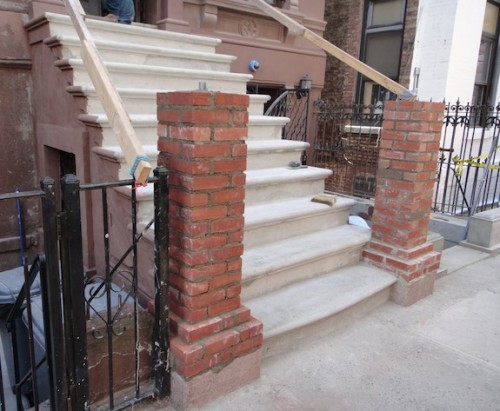 Brick core for masonry newel posts on brownstone stoop Brick core for masonry newel posts on brownstone stoop